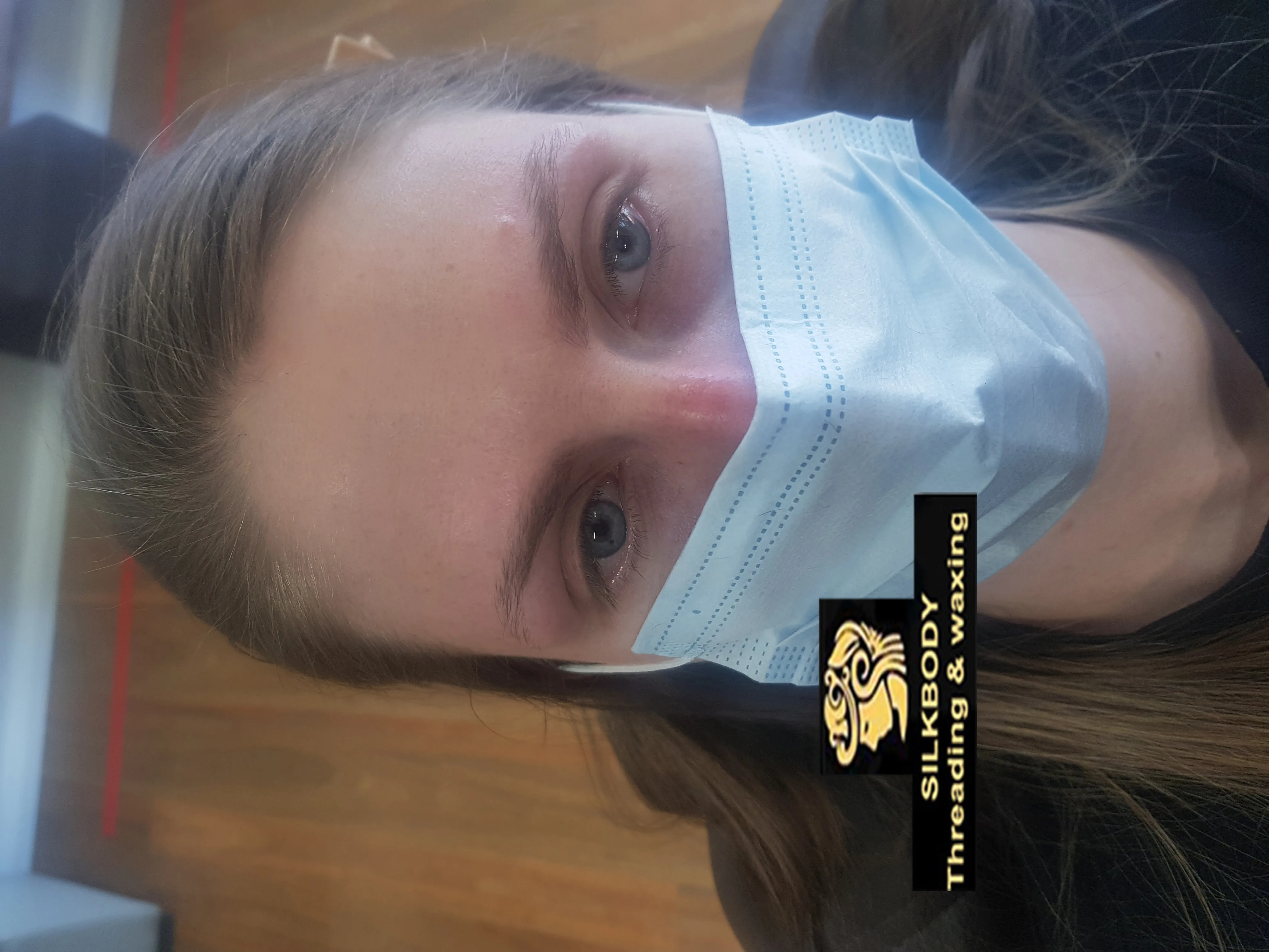 Tidied brow result on a masked client
